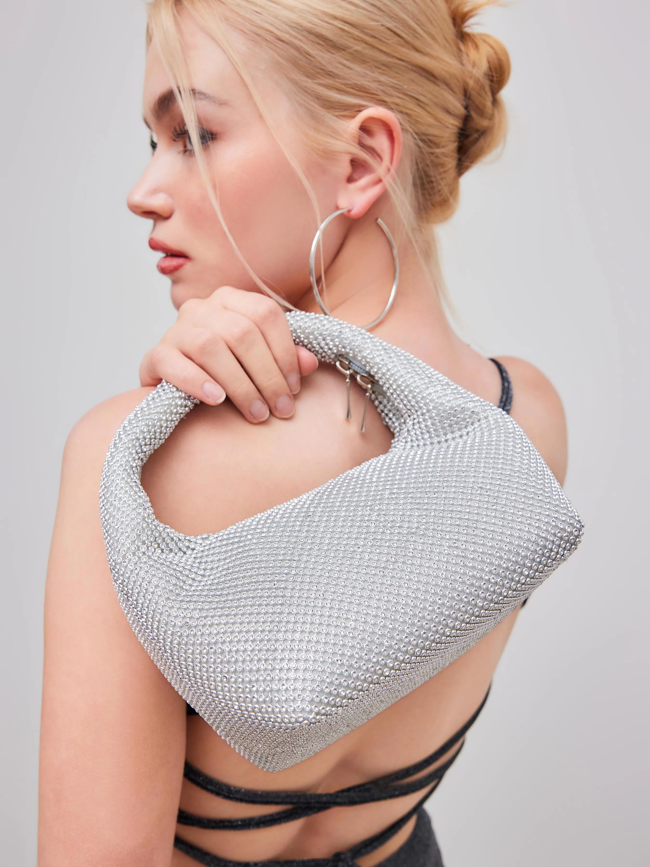 Bolso de mano con pedrería